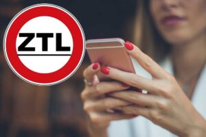 Donna con cellulare, ZTL
