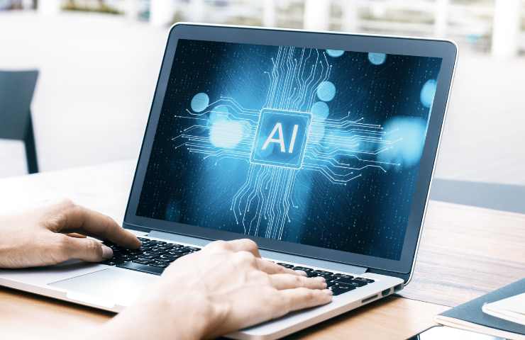 pc con scritta ai