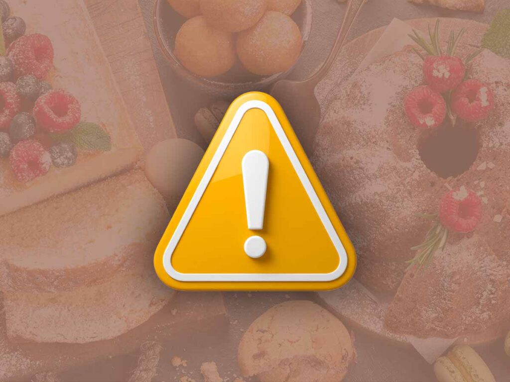 triangolo giallo con punto esclamativo al centro